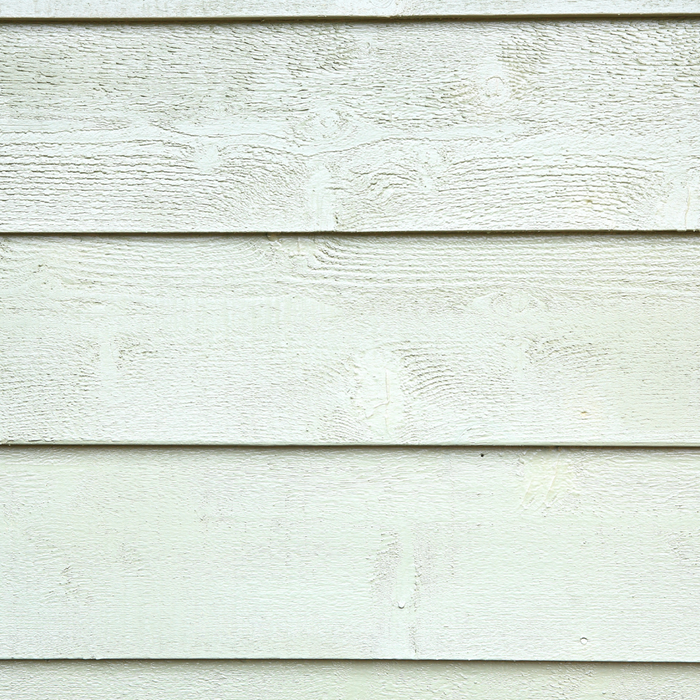 mint green painted cement fiber siding