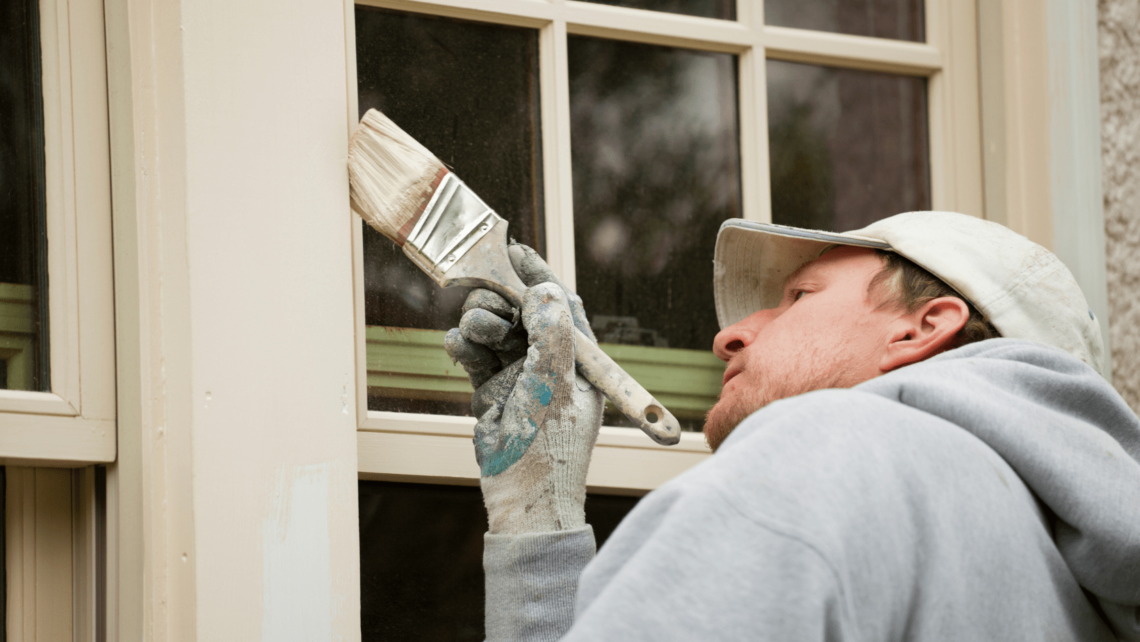 exterior window being painted