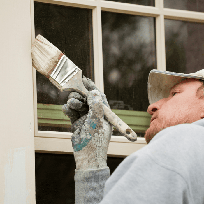 exterior window being painted