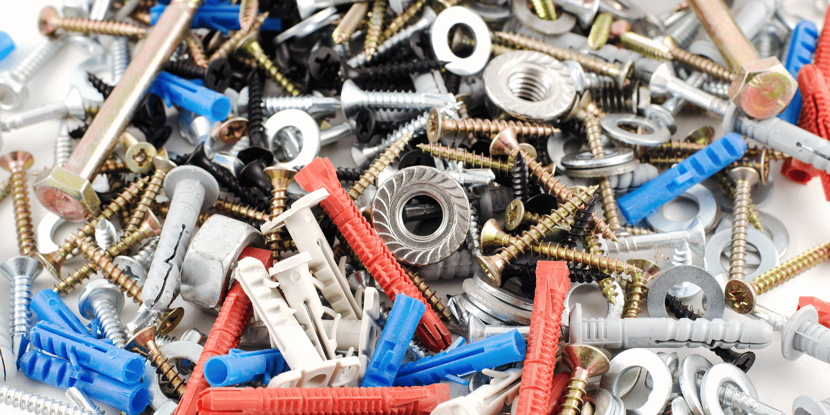 handful of hardware fasteners