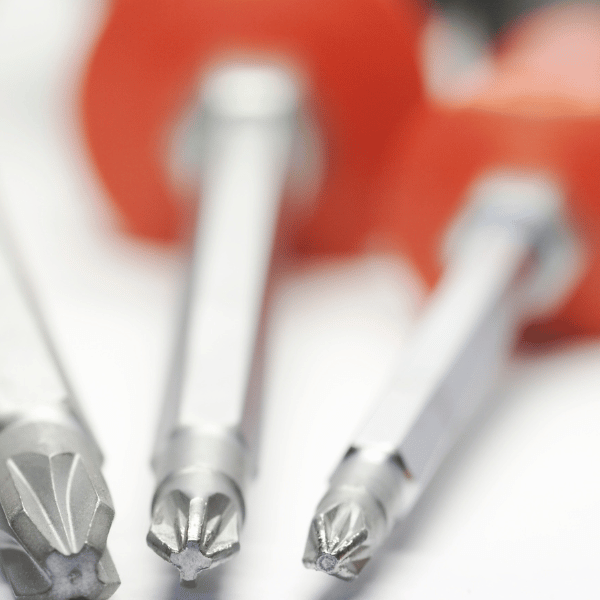 blurred close-up image of screwdriver heads