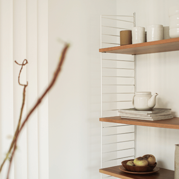 wooden shelves against a white backdrop